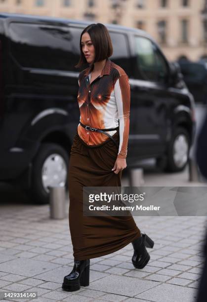 Tiffany Hsu seen wearing a total Jean Paul Gaultier x y/project look, outside Schiaparelli during Paris Fashion Week on September 29, 2022 in Paris,...