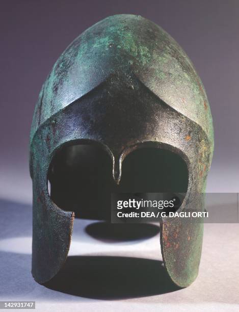 Bronze Chalkidiki Helmet, found in Evia . Greek Civilization, 6th Century BC. Athens, Moussío Kanelopoúlos