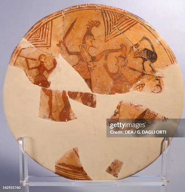 Votive shield showing a battle scene between Achilles and Pentesilea during the Siege of Troy, terracotta from the Archaic period, Greece. Greek...