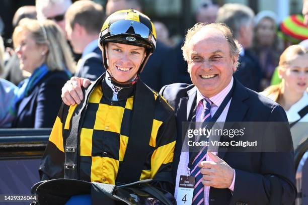 Michael Dee poses with Henry Plumptre after riding Excelida to win Race 4, the Furphy Rose Of Kingston Stakes, during Turnbull Stakes Day at...