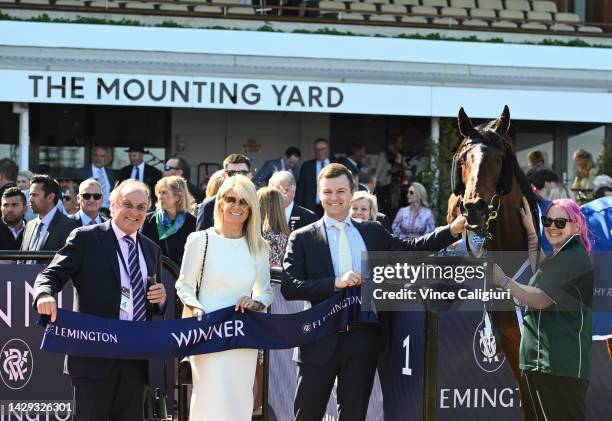 Henry Plumptre and trainer Ben Hayes pose with Excelida after winning Race 4, the Furphy Rose Of Kingston Stakes, during Turnbull Stakes Day at...