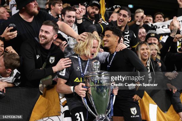 Lachlan Rose of Macarthur FC and Daniel Arzani of Macarthur FC celebrate with fans after winning the Australia Cup Final match between Sydney United...