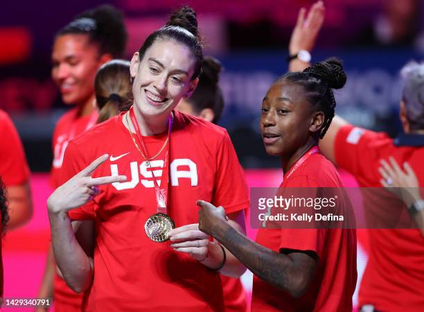 Breanna Stewart of the United States and Jewell Loyd of the United States celebrate Team USA winning the Gold Medal during the 2022 FIBA Women's...