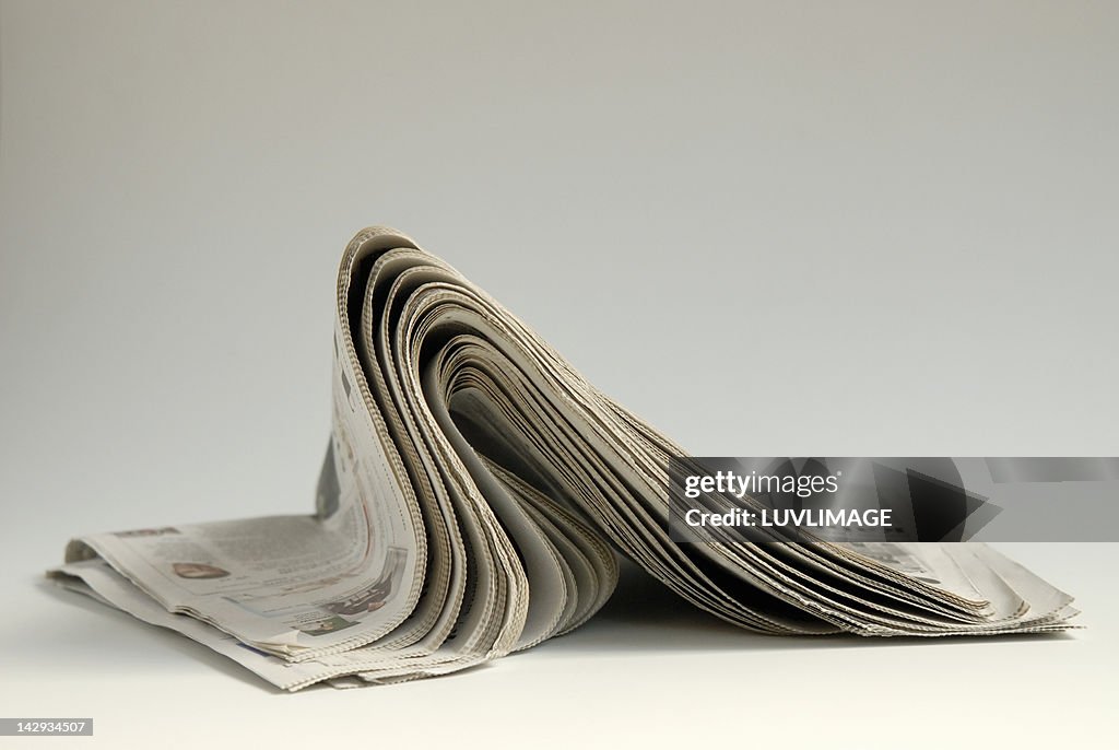Folded newspaper