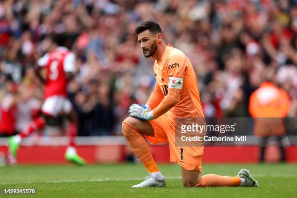 Hugo Lloris of Tottenham Hotspur looks dejected after Granit Xhaka of Arsenal scores their sides third goal during the Premier League match between...