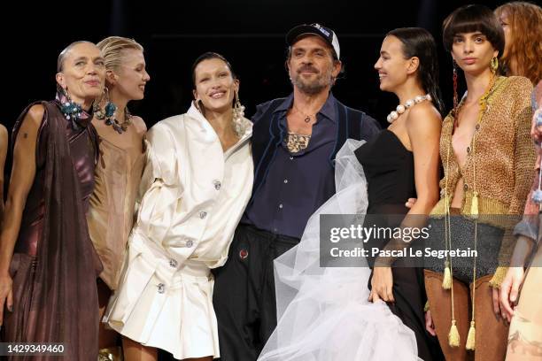 Designer Andreas Kronthaler poses with Stella Maxwell , Bella Hadid , Irina Shayk and models on the runway during the Vivienne Westwood Womenswear...