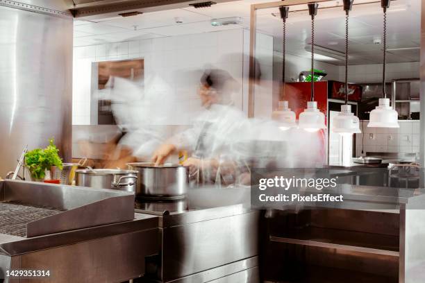 motion blurred chefs - long exposure restaurant stock pictures, royalty-free photos & images
