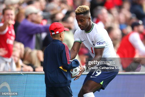 Ryan Sessegnon of Tottenham Hotspur grabs the ball from a ball boy during the Premier League match between Arsenal FC and Tottenham Hotspur at...