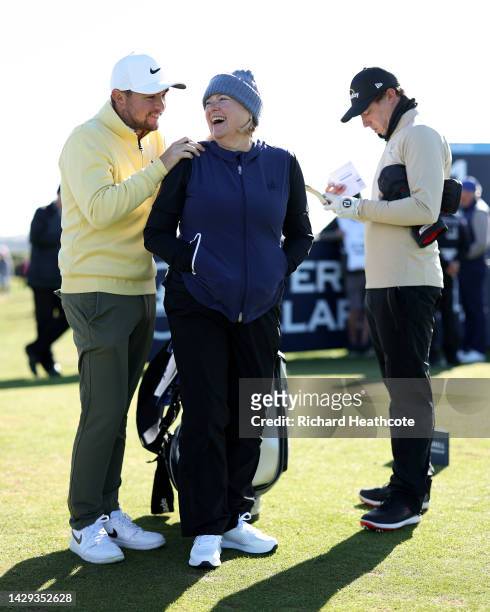Alex Fitzpatrick of England laughs with Susan Fitpatrick, as Matthew Fitzpatrick reviews their scorecard on Day Three of the Alfred Dunhill Links...