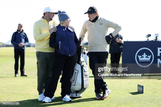 Alex Fitzpatrick of England speaks with their mother Susan Fitpatrick and their brother Matthew Fitzpatrick on Day Three of the Alfred Dunhill Links...