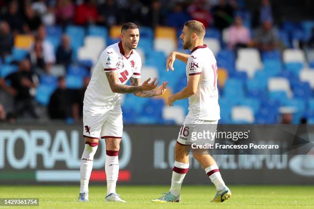 Antonio Sanabria of Torino FC celebrates with teammate Nikola Vlasic after scoring the first goal for his team during the Serie A match between SSC...