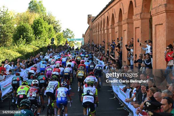 General view of the peloton climbing to San Luca while fans cheer during the 105th Giro dell'Emilia 2022 a 198,7km one day race from Carpi to San...