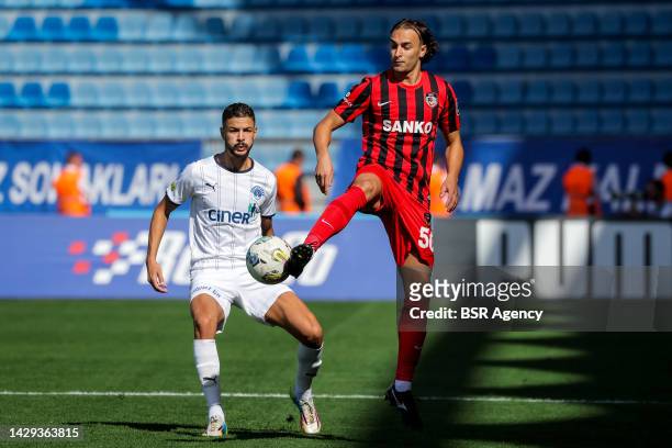 Mortadha Ben Ouanes of Kasimpasa SK challenges Lazar Markovic of Gaziantep FK during the Turkish Super Lig match between Kasimpasa SK and Gaziantep...