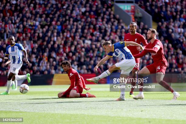 Leandro Trossard of Brighton & Hove Albion scores their sides first goal during the Premier League match between Liverpool FC and Brighton & Hove...