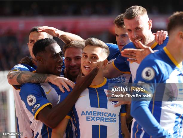 Leandro Trossard of Brighton & Hove Albion celebrates with team mates after scoring their sides first goal during the Premier League match between...