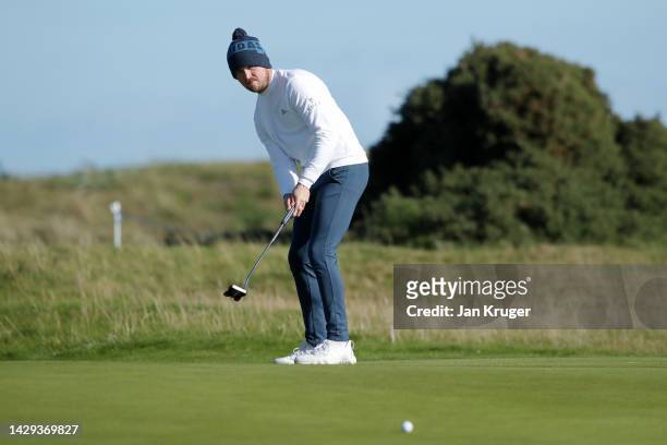 Richard Mansell of England putts on the 17th green on Day Three of the Alfred Dunhill Links Championship at Carnoustie Golf Links on October 01, 2022...