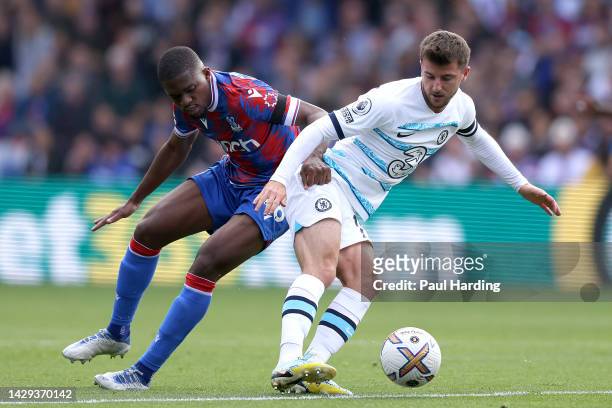 Mason Mount of Chelsea is challenged by Cheick Doucoure of Crystal Palace during the Premier League match between Crystal Palace and Chelsea FC at...