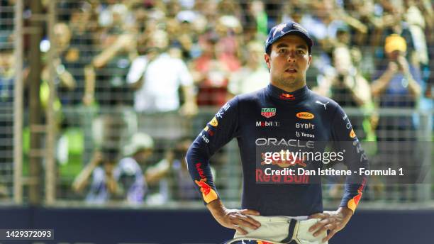 Second placed qualifier Sergio Perez of Mexico and Oracle Red Bull Racing looks on in parc ferme during qualifying ahead of the F1 Grand Prix of...