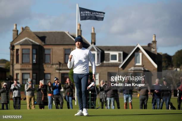 Richard Mansell of England celebrates putting for a birdie on the 18th green on Day Three of the Alfred Dunhill Links Championship at Carnoustie Golf...