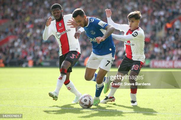 Dwight McNeil of Everton is put under pressure by Ainsley Maitland-Niles and Juan Larios of Southampton during the Premier League match between...