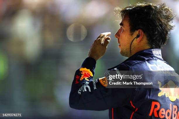 Second placed qualifier Sergio Perez of Mexico and Oracle Red Bull Racing looks on in parc ferme during qualifying ahead of the F1 Grand Prix of...