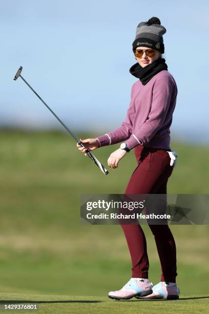 Kathryn Newton putts on the 17th green on Day Three of the Alfred Dunhill Links Championship on the Old Course St. Andrews on October 01, 2022 in St...