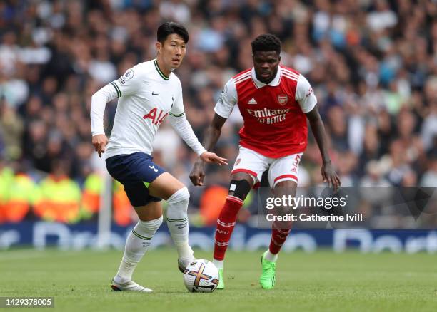 Son Heung-Min of Tottenham Hotspur and Thomas Partey of Arsenal during the Premier League match between Arsenal FC and Tottenham Hotspur at Emirates...