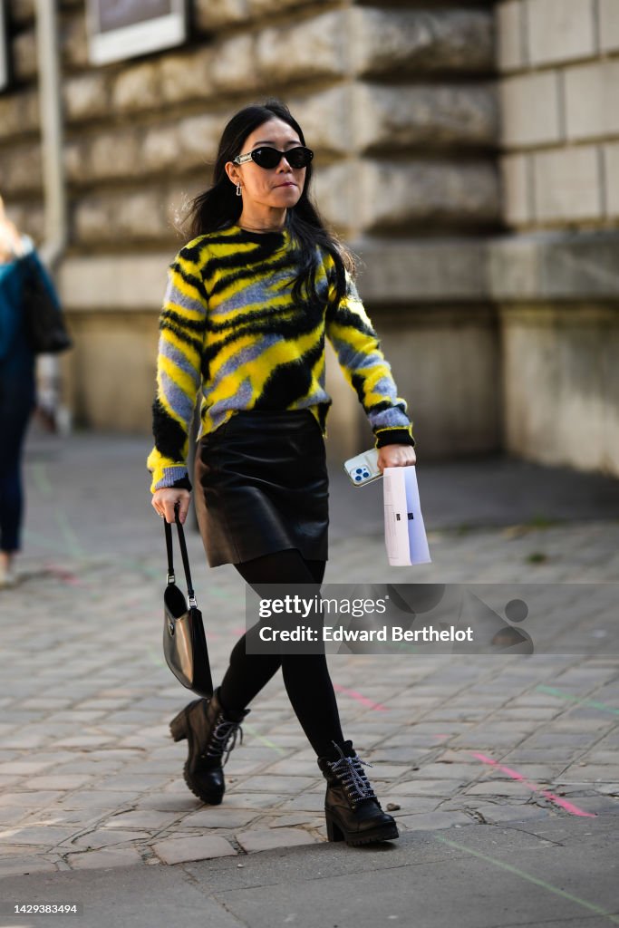 Street Style - Paris Fashion Week - Womenswear Spring/Summer 2023 : Day Five