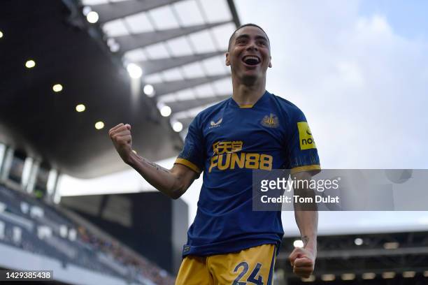 Miguel Almiron of Newcastle United celebrates after scoring their sides fourth goal during the Premier League match between Fulham FC and Newcastle...