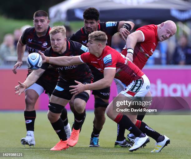 Jack van Poortvliet of Leicester Tigers attempts to gather the ball as Jackson Wray challenges during the Gallagher Premiership Rugby match between...