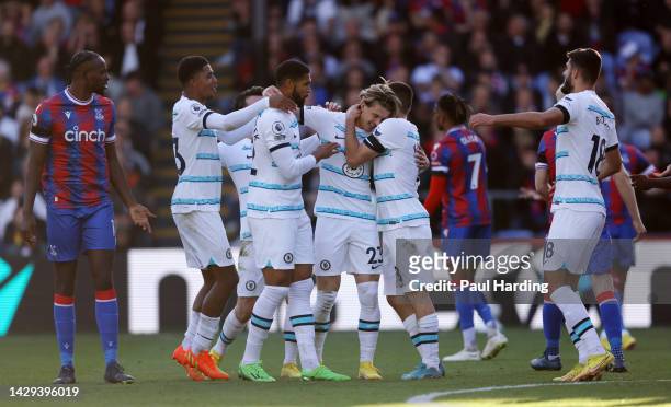 Conor Gallagher of Chelsea celebrates with teammates after scoring their team's second goal during the Premier League match between Crystal Palace...