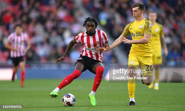 Preston player Ben Woodburn challenges Sunderland player Abdoullah Ba during the Sky Bet Championship between Sunderland and Preston North End at...