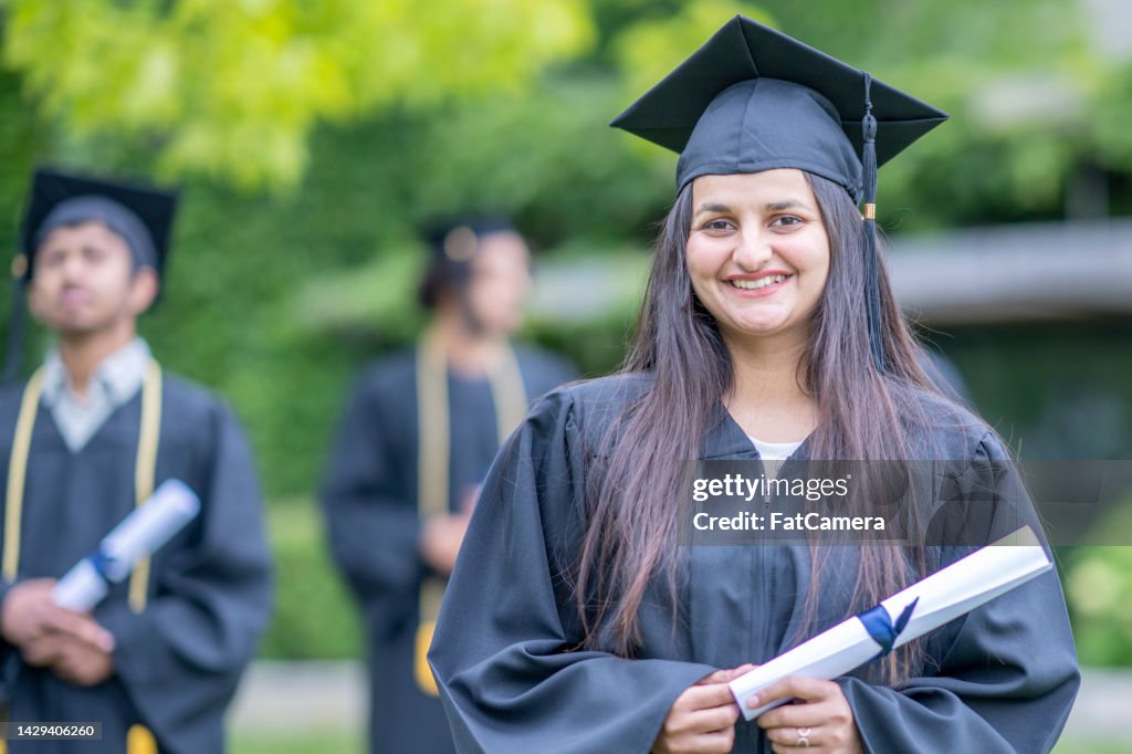 Graduafe Portrait Of A University Graduate High-Res Stock Photo - Getty Images