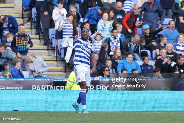 Yakou Meite of Reading celebrates after scoring his side's third goal during the Sky Bet Championship between Reading and Huddersfield Town at Select...