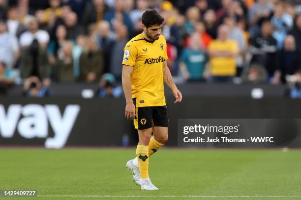 Pedro Neto of Wolverhampton Wanderers leaves the pitch injured during the Premier League match between West Ham United and Wolverhampton Wanderers at...