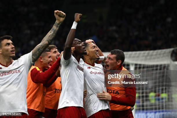 Chris Smalling of AS Roma celebrates with teammates after scoring their team's second goal during the Serie A match between FC Internazionale and AS...