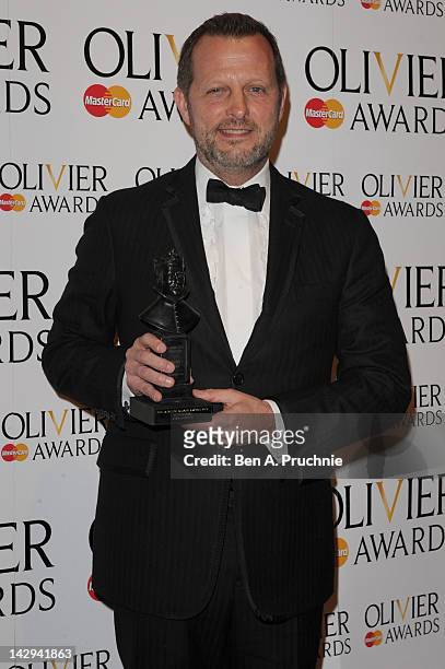 Rob Ashford, winner of Best Revival for "Anna Christie" poses in the press room during the 2012 Olivier Awards at The Royal Opera House on April 15,...