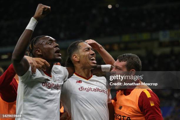 Chris Smalling of AS Roma celebrates with team mates Tammy Abraham and Andrea Belotti after scoring to give the side a 2-1 lead during the Serie A...