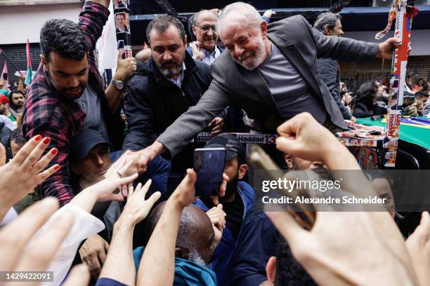 Former president of Brazil and Candidate of Worker’s Party Luiz Inácio Lula Da Silva greets supporters during the closing rally of the presidential...