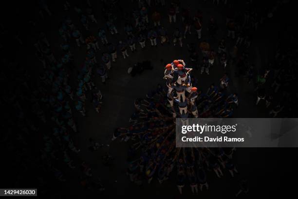 Members of the colla 'Marrecs de Salt' build a human tower during the 28th Tarragona Competition on October 1, 2022 in Tarragona, Spain. The...