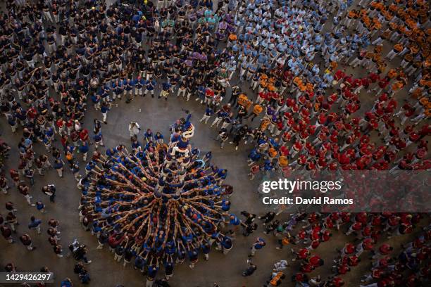 Members of the colla 'Castellers de la Vila de Gracia' build a human tower during the 28th Tarragona Competition on October 1, 2022 in Tarragona,...