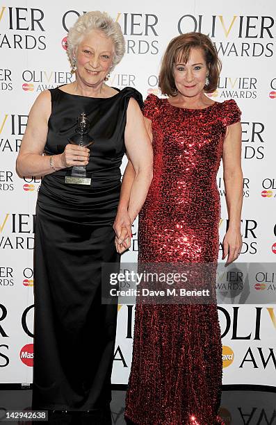 Special Award winner Dame Monica Mason and presenter Zoe Wanamaker pose in the press room at the 2012 Olivier Awards held at The Royal Opera House on...