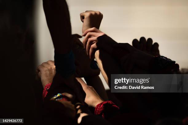 Members of the colla 'Castellers d'Andorra' build a human tower during and event of International colles ahead of the 28th Tarragona Competition on...