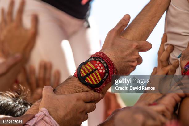 Members of the 'Colla Castellera de Madrid' build a human tower during and event of International colles ahead of the 28th Tarragona Competition on...