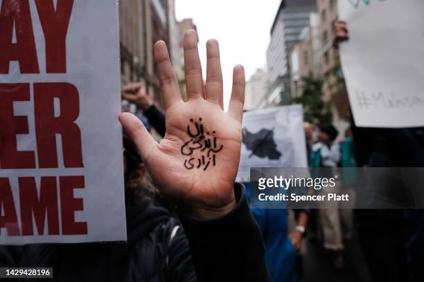 Protesters gather in Manhattan to show their opposition to the Iranian regime following the death of Mahsa Amini, a 22-year-old Iranian woman who...