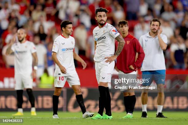 Alex Telles of Sevilla FC looks dejected following their sides defeat in the LaLiga Santander match between Sevilla FC and Atletico de Madrid at...