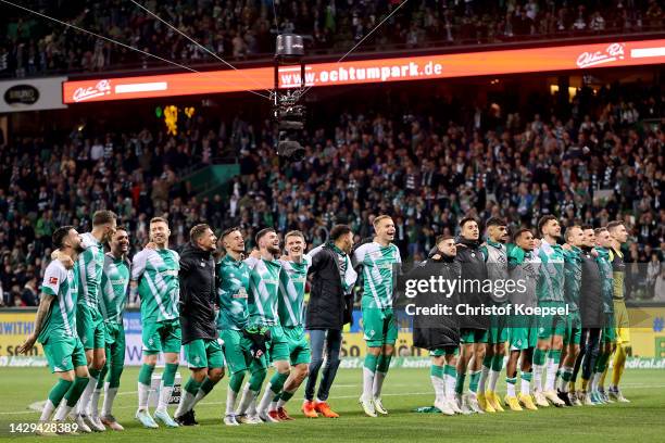 Players of Werder Bremen celebrate towards the fans following their sides victory in the Bundesliga match between SV Werder Bremen and Borussia...