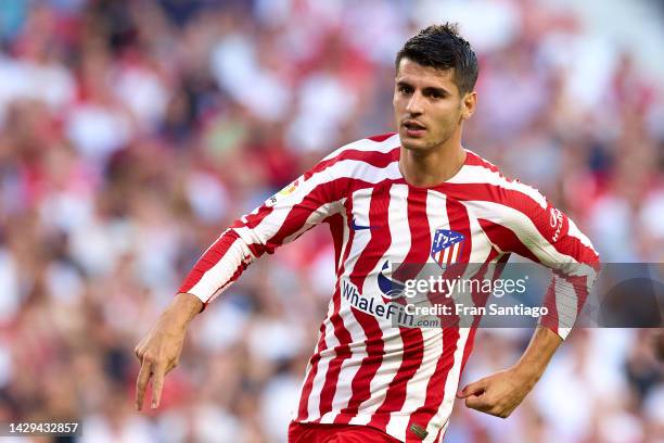 Alvaro Morata of Atletico de Madrid celebrates scoring their teams second goal with team mates during the LaLiga Santander match between Sevilla FC...