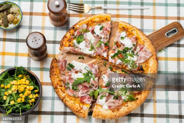 pizza with ham burrata cheese and rocket salad - burrata stock pictures, royalty-free photos & images