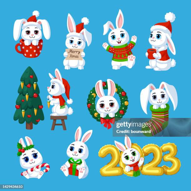 cute christmas bunnies on blue background. - new year cartoon stock illustrations